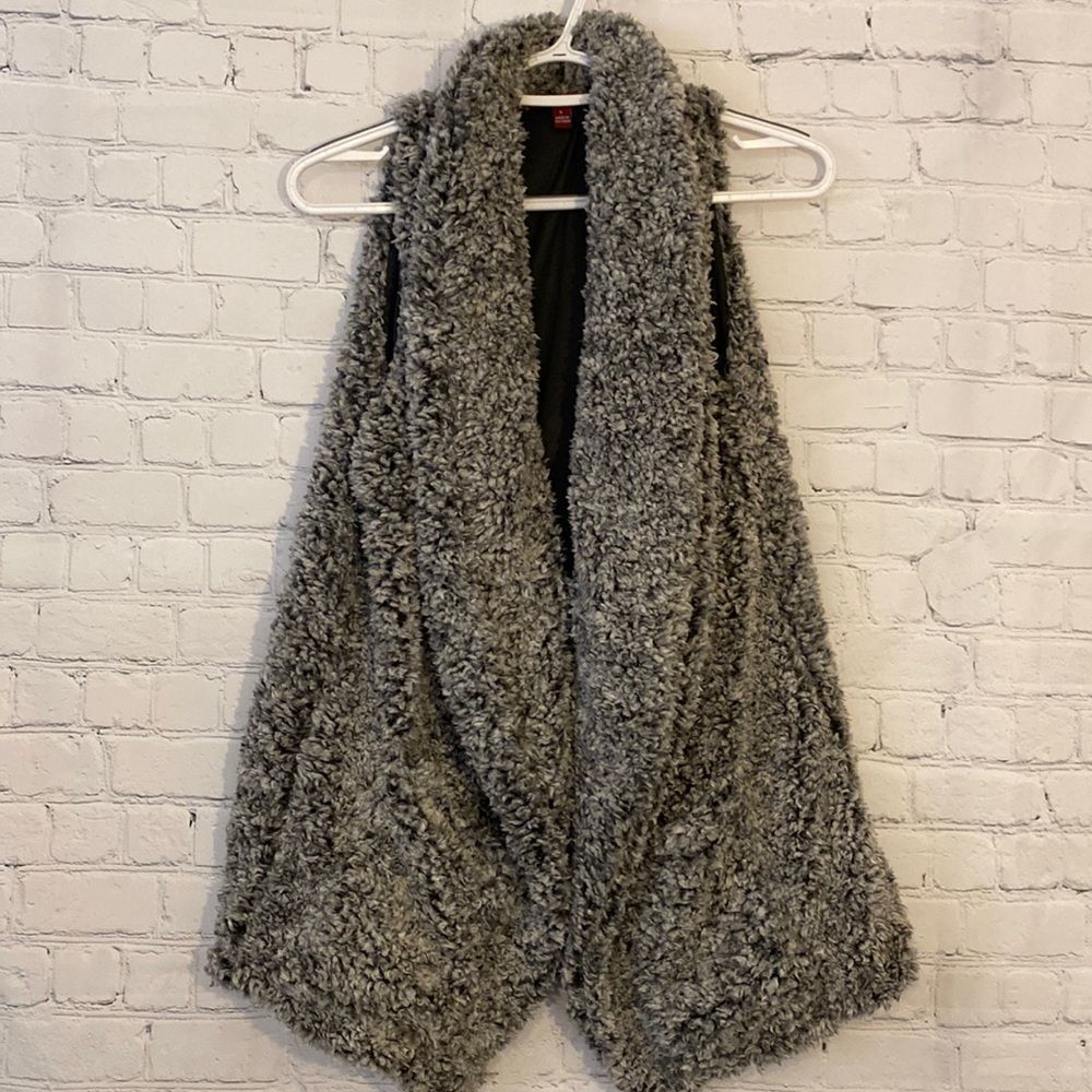 Cute fuzzy vest to keep you warm!